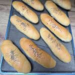 Czech Rohlíky rolls on a cooling rack.