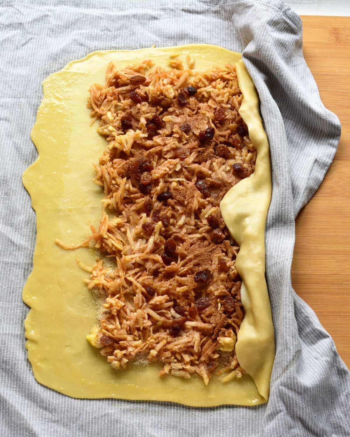 rolling the strudel dough up