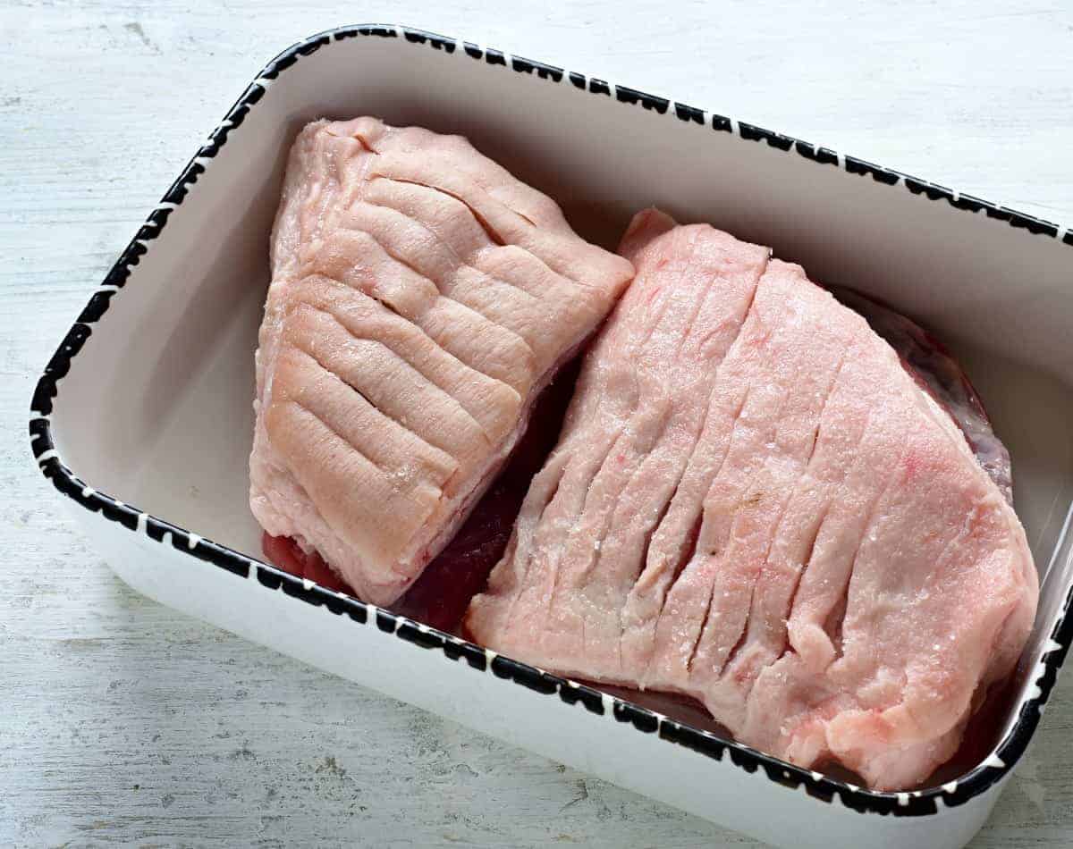 pork belly in a baking dish