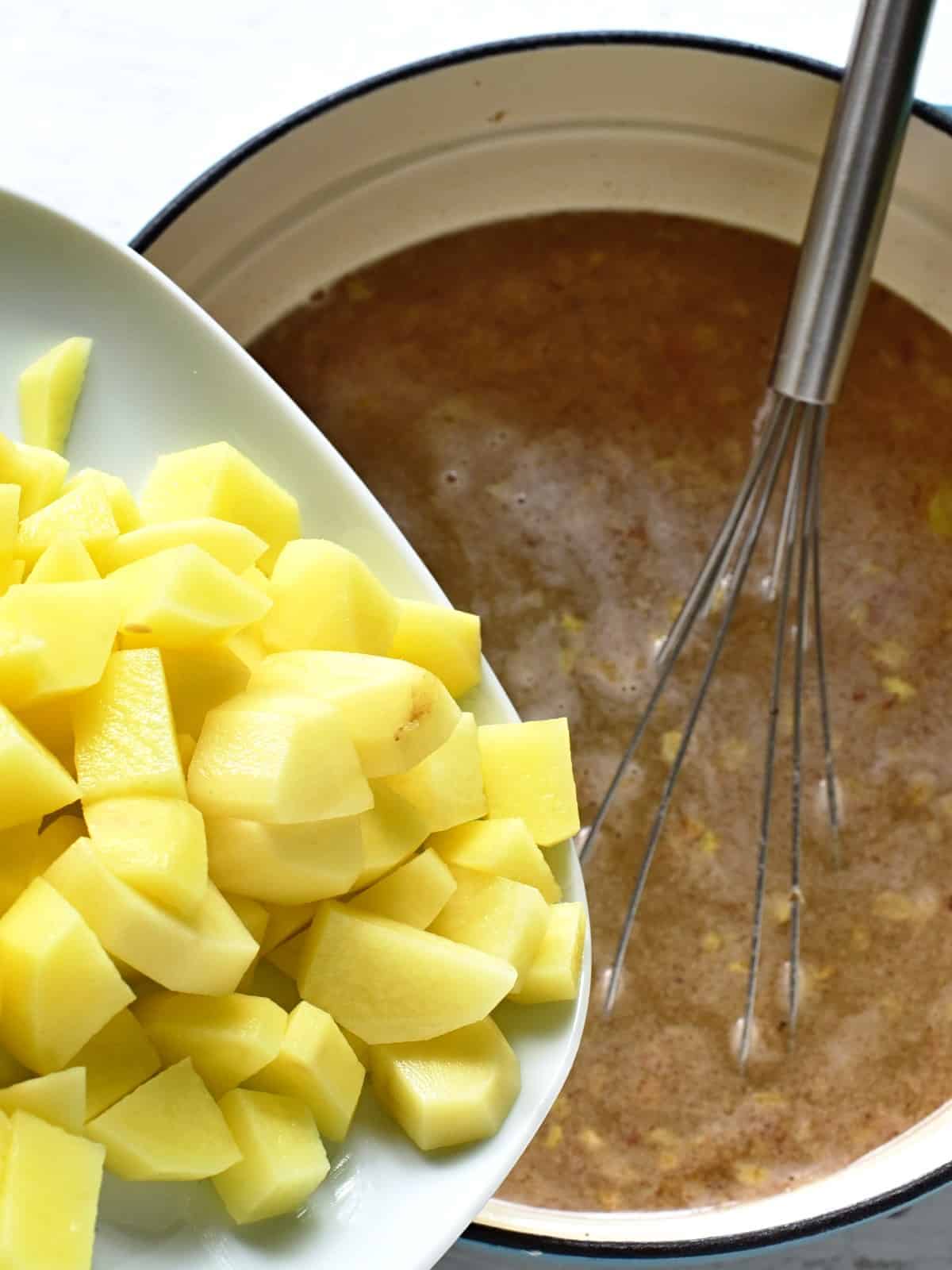 adding potatoes
