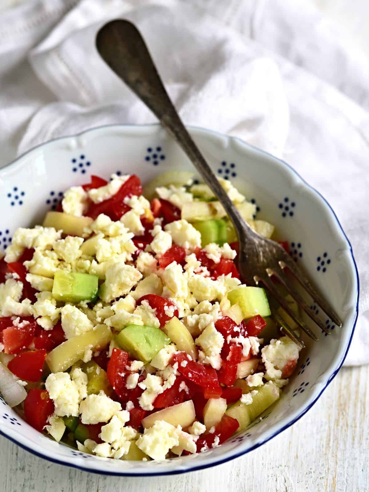 shopska salad served in a bowl