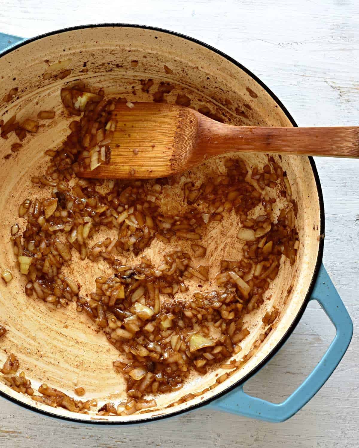 Frying onions in a pan.