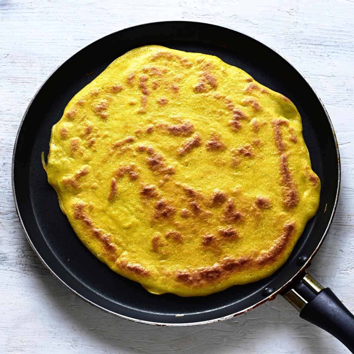 Frying pancake for celestýnské noodles.