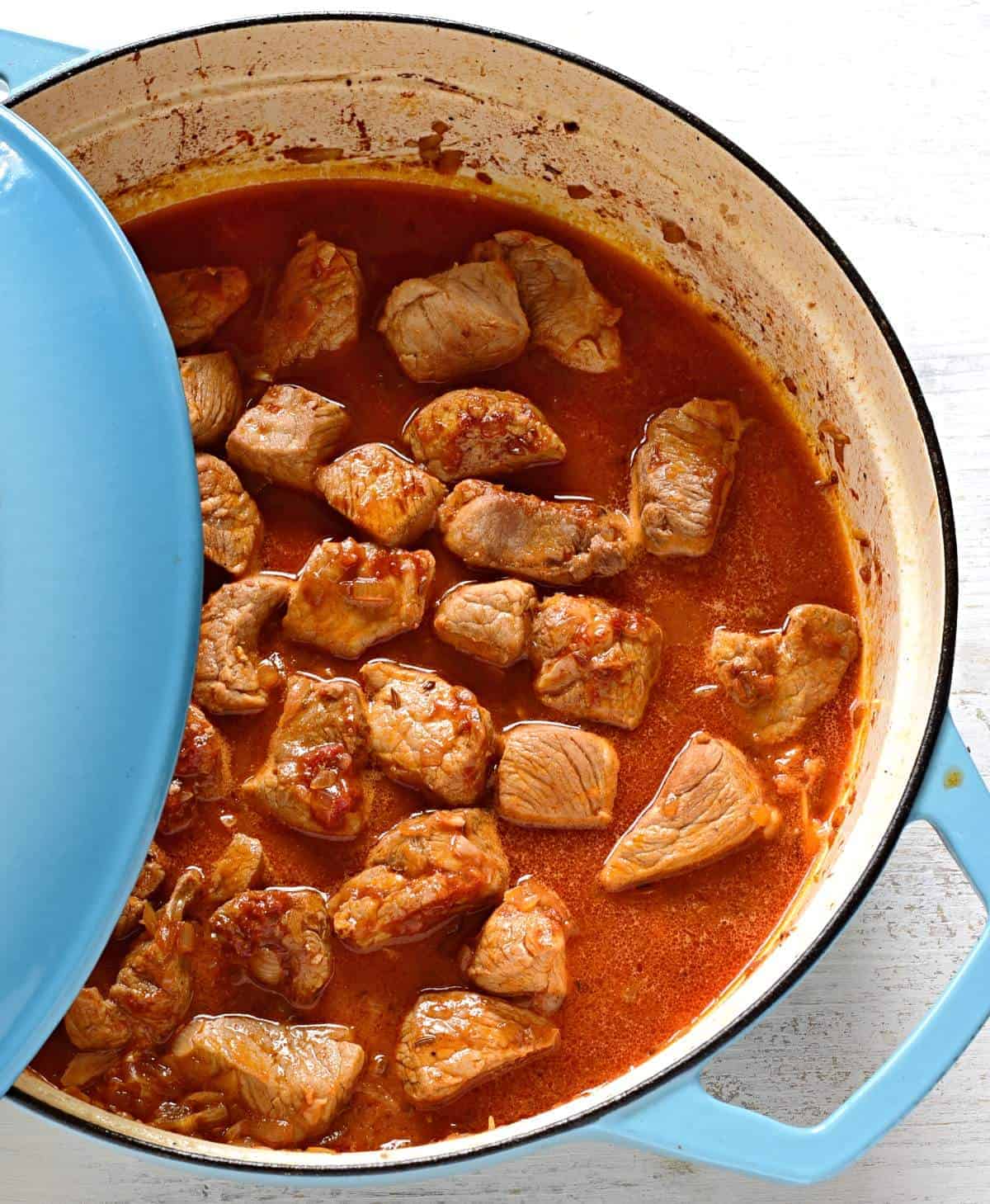 Slow simmering of pork goulash.
