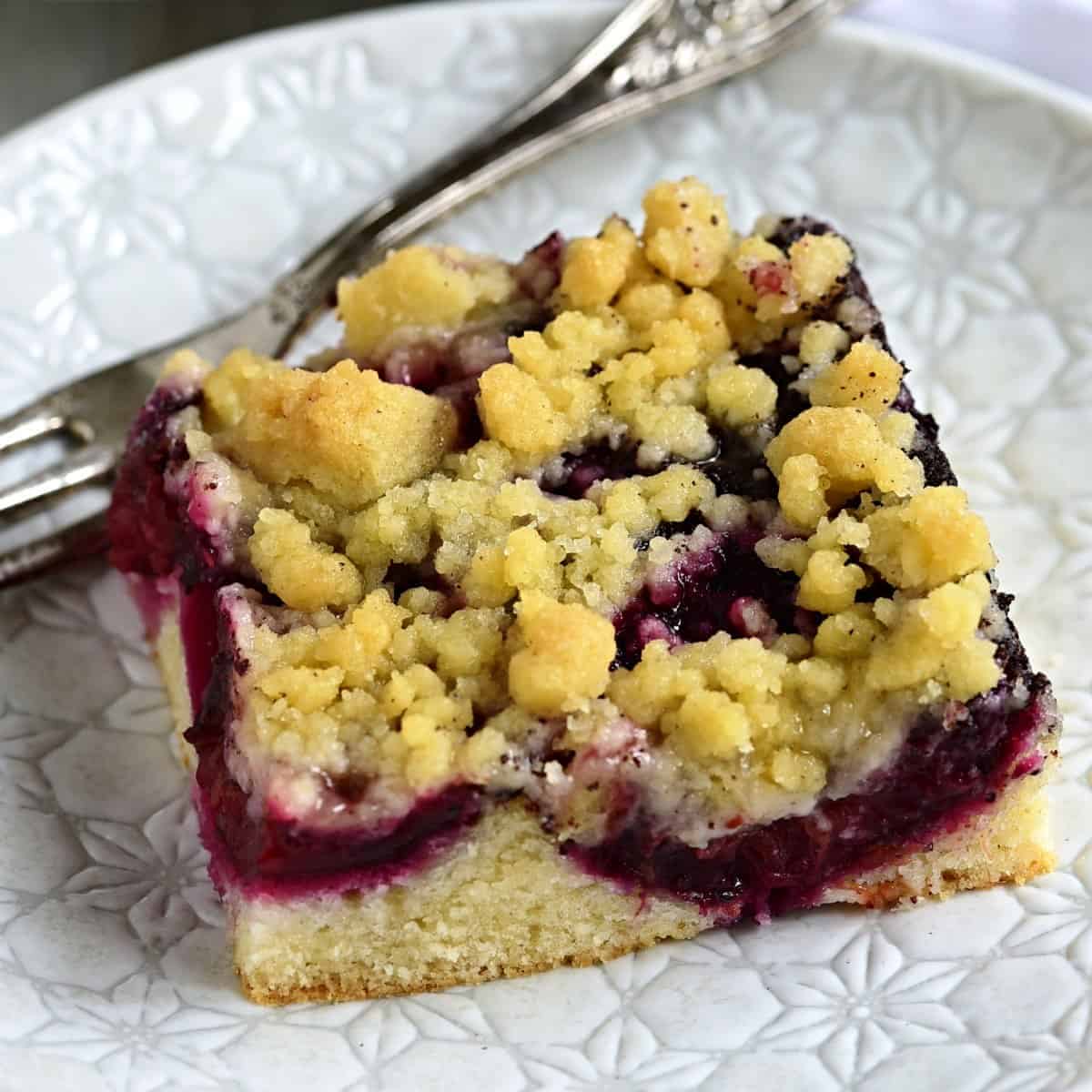 Zwetschgenkuchen served with a fork.