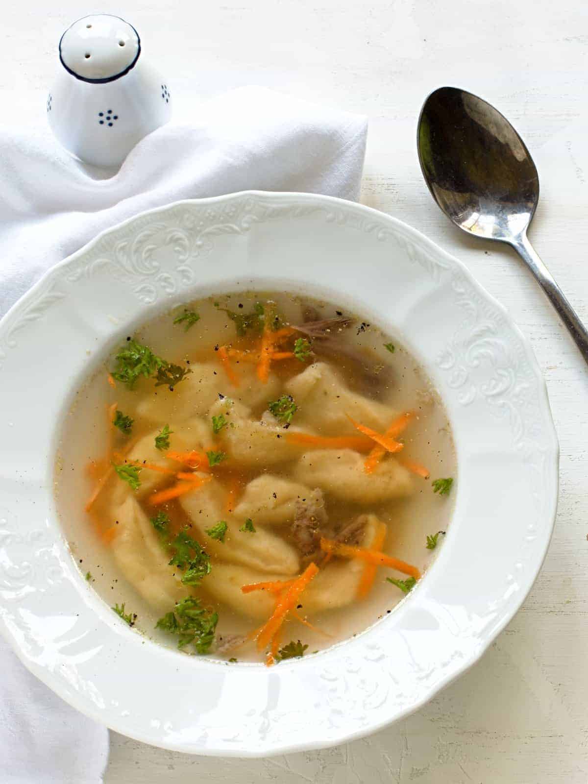 Egg dumplings in beef broth.