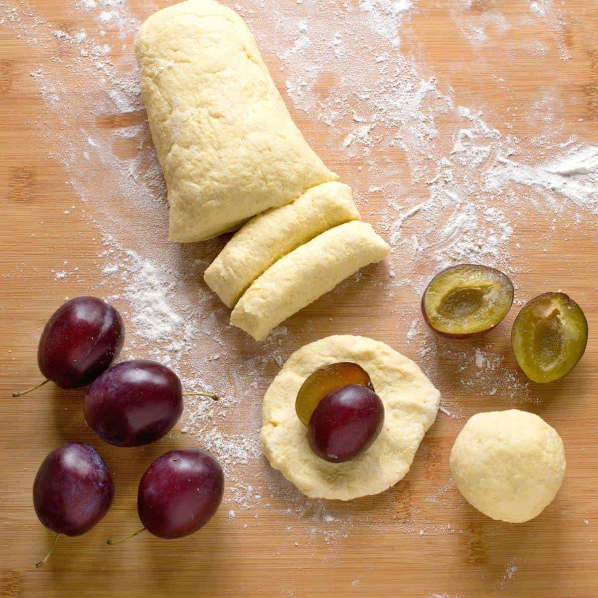 Making plum potato dumplings.