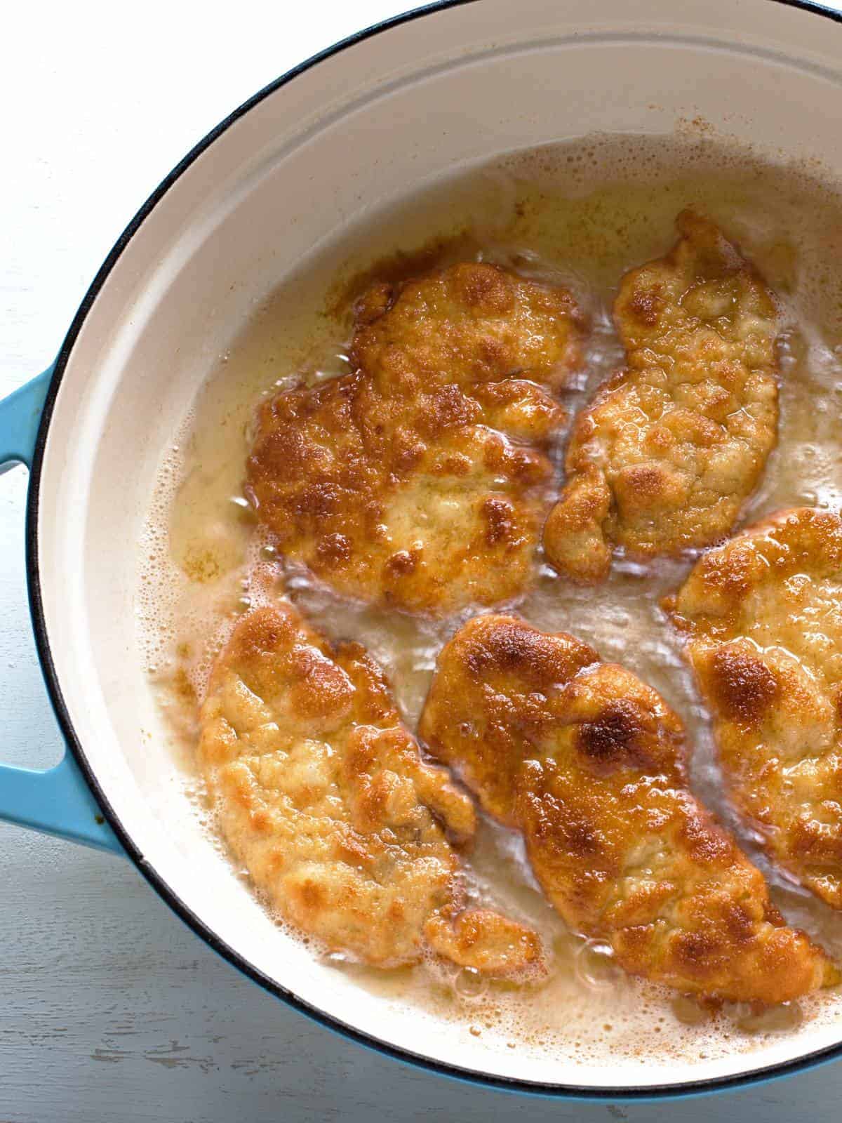 Frying schnitzels.