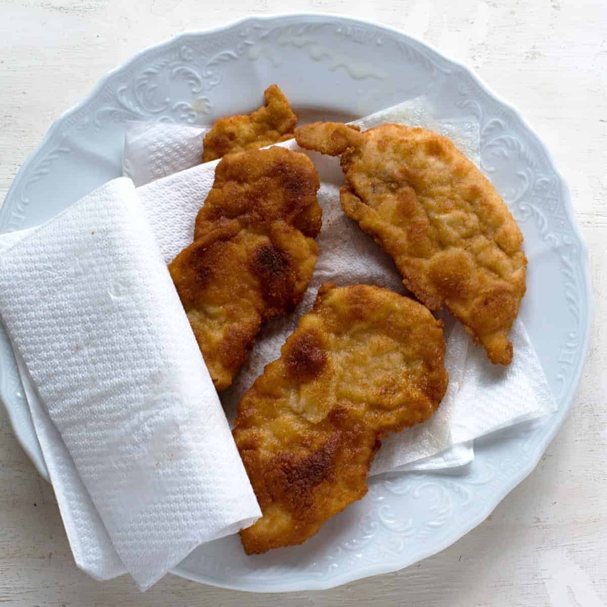 Making chicken schnitzels.