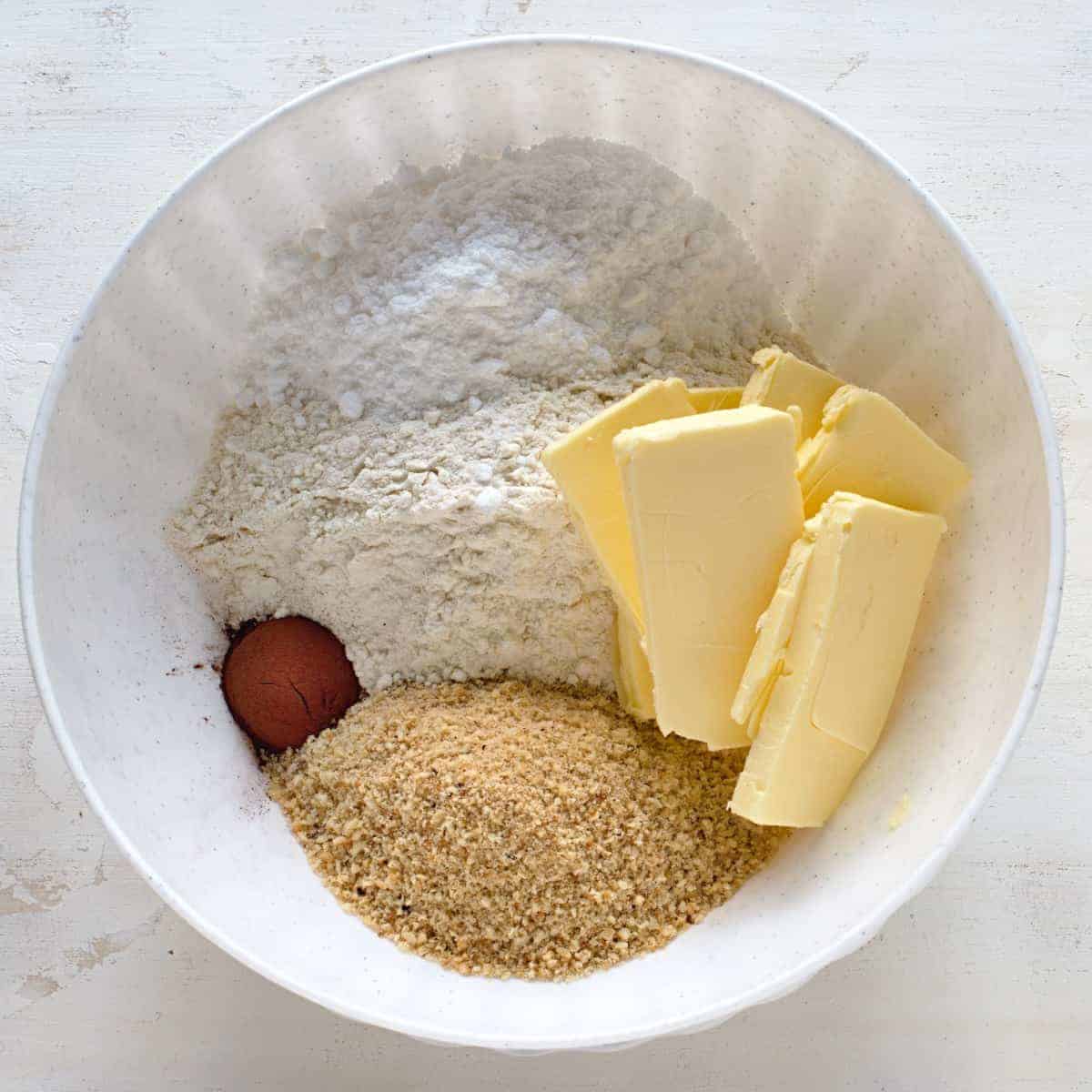 Making nut cookie dough in a bowl.