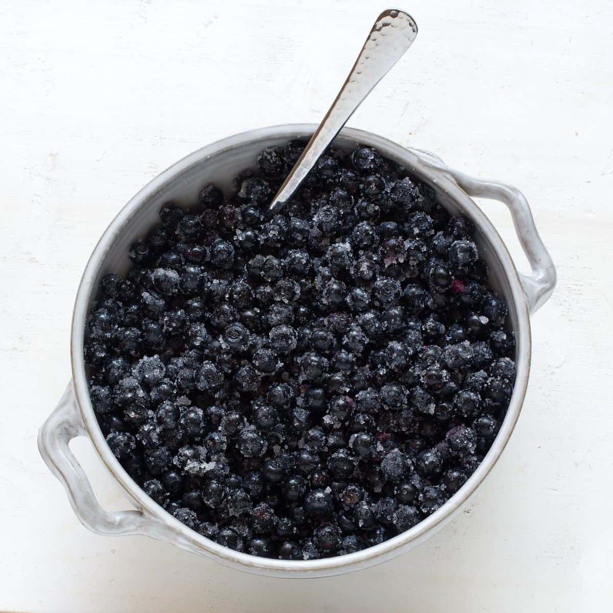 Wild blueberries mixed with sugar. 