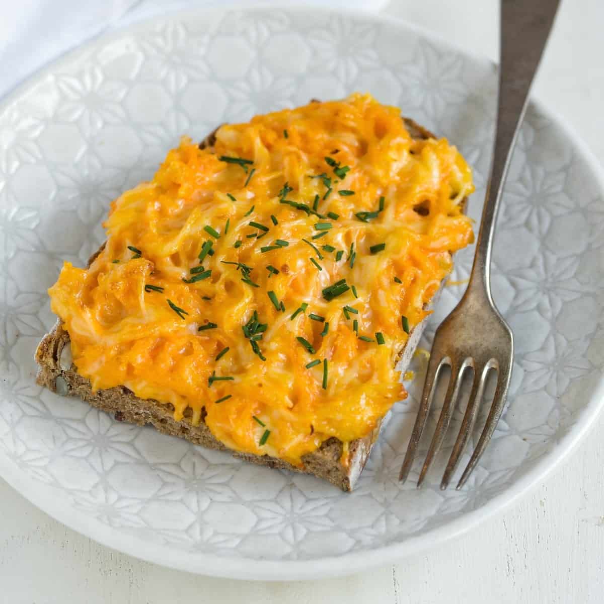 Open-faced sandwich with cheese carrot spread, broiled in the oven.