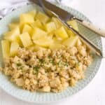 Scrambled eggs with cauliflower, Czech kvetakovy mozecek, served with boiled potatoes.