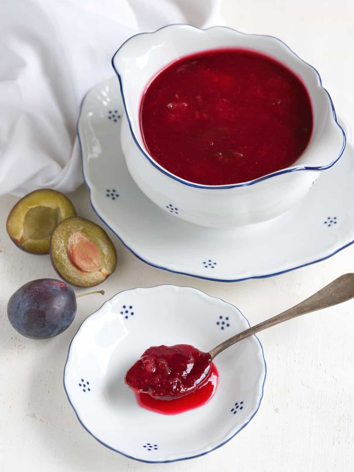 Czech klevela plum compote served in a cup.