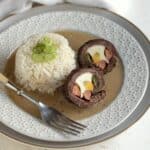 Czech ptacky beef roll ups with gravy and rice.