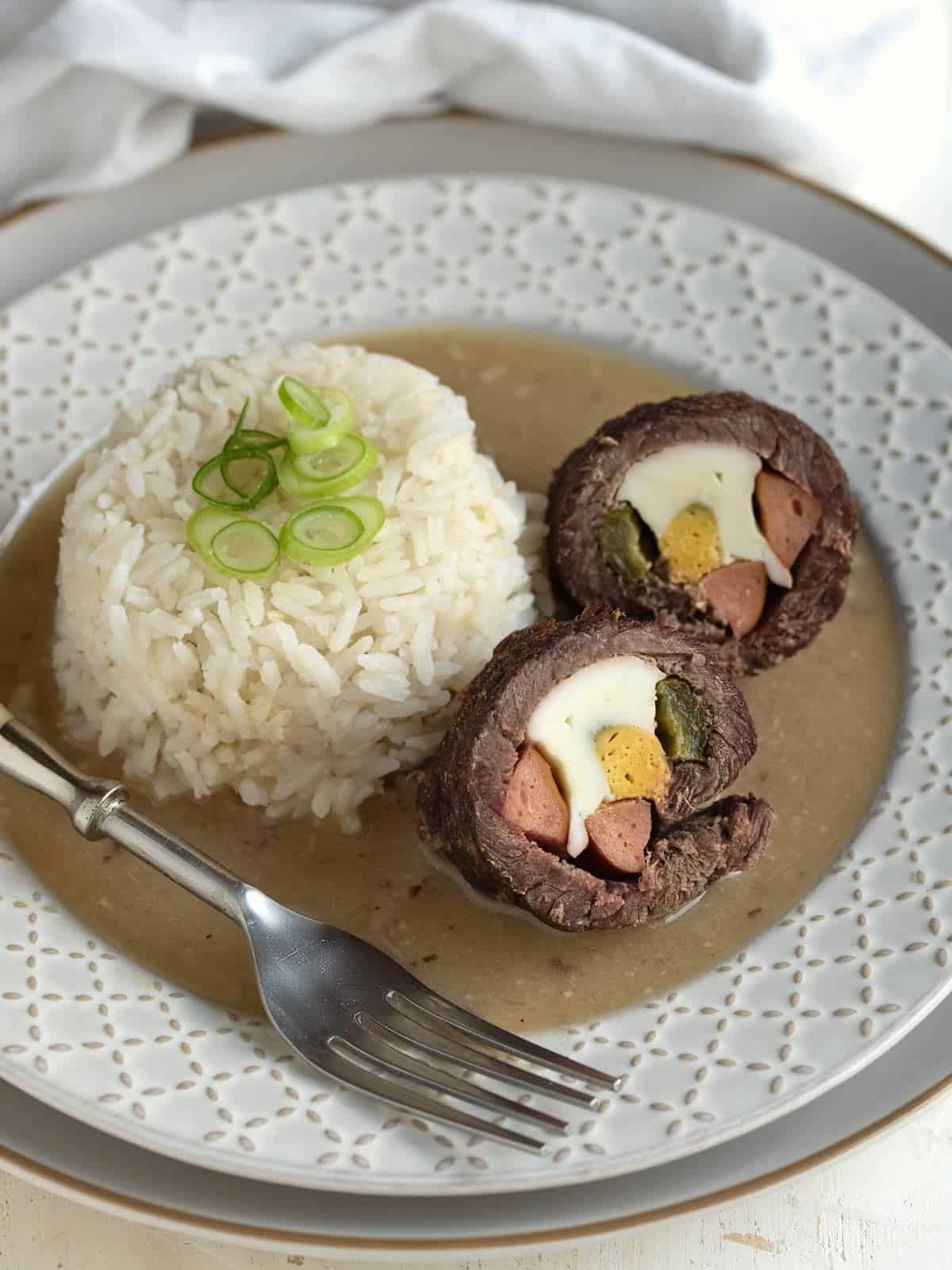 Czech spanelske ptacky beef roll ups served with rice and gravy.