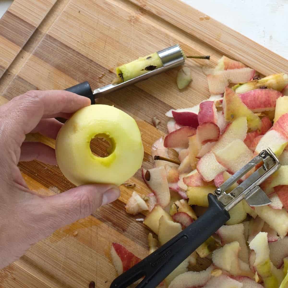 Cut out through an apple, core removed.