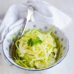 Vinegar based coleslaw (no mayo) served in a bowl.