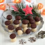 Mushroom shaped no bake cookies served on a plate.