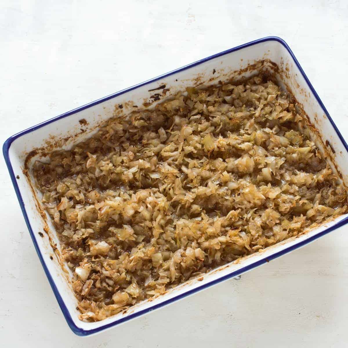 Baked sweet cabbage filling in a baking tray.