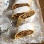 Apple strudel slices on a parchment paper.