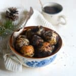 Slovak sweet bobalki balls sprinkled with poppy seeds, served in a bowl.