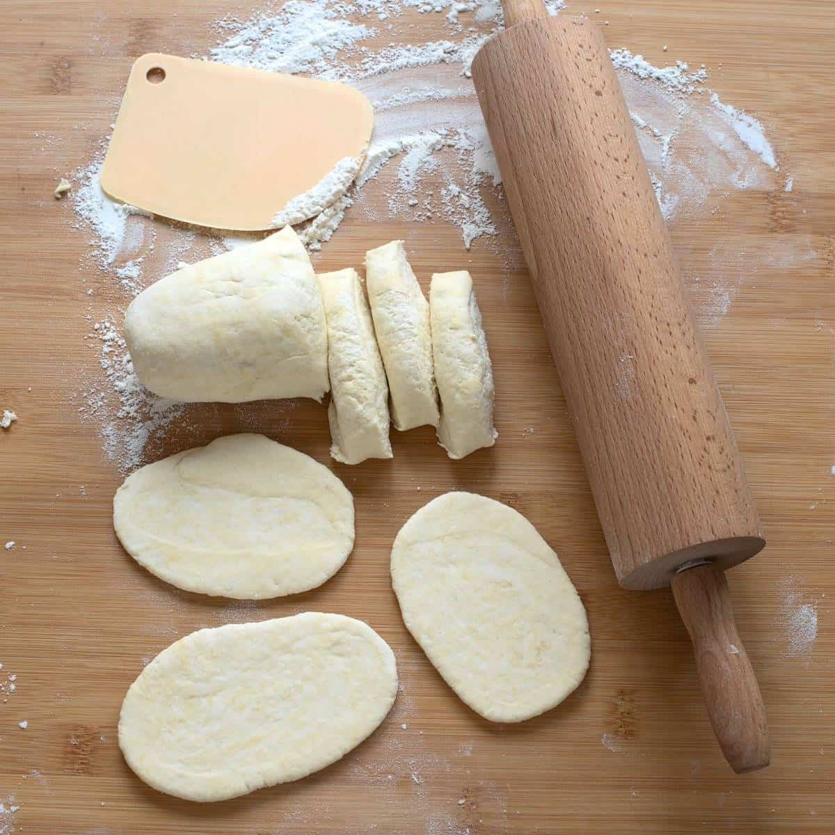 Farmers cheese pancakes rolled out of cheese dough, using a rolling pin.