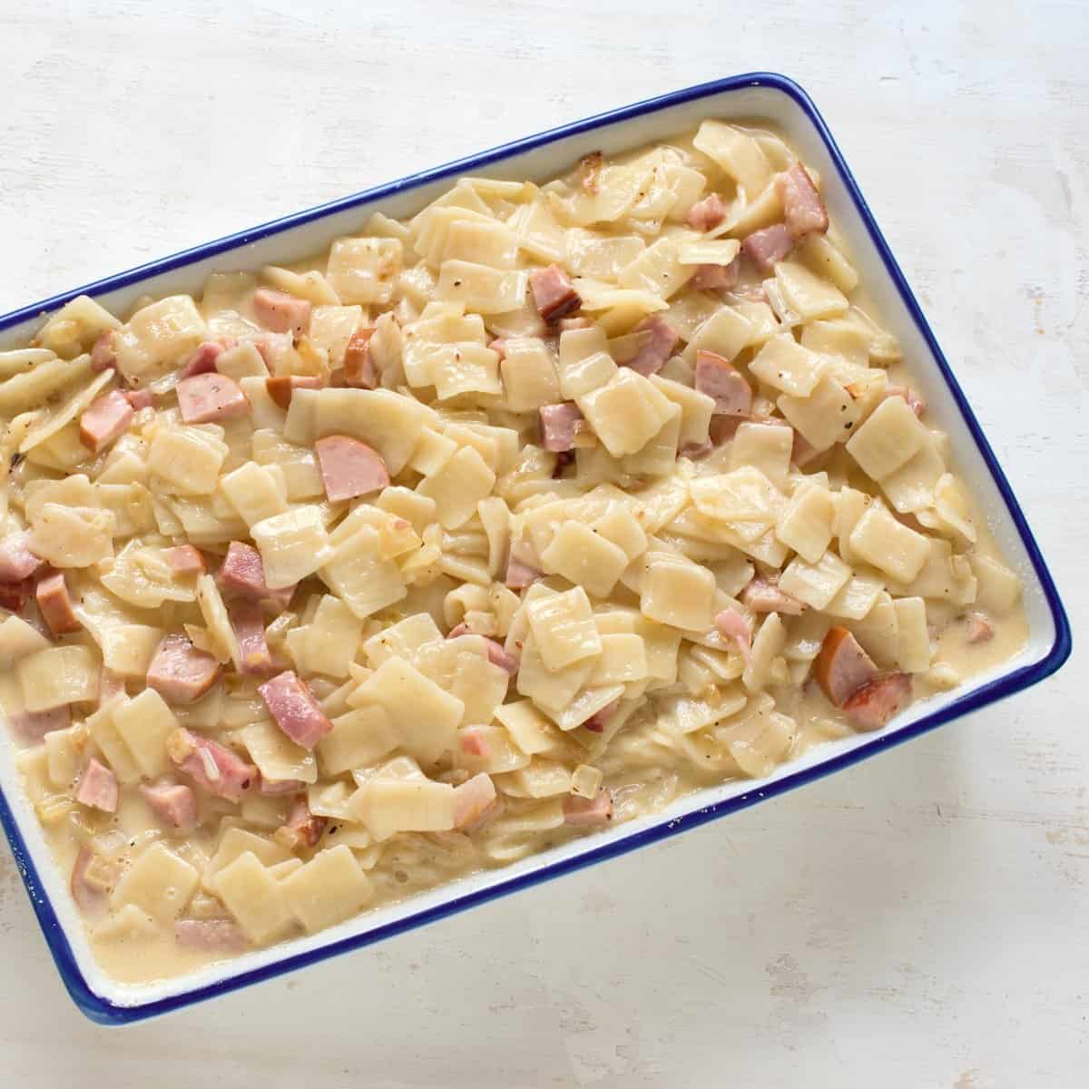 Czech Sunkofleky, ham and noodle casserole in a baking dish.