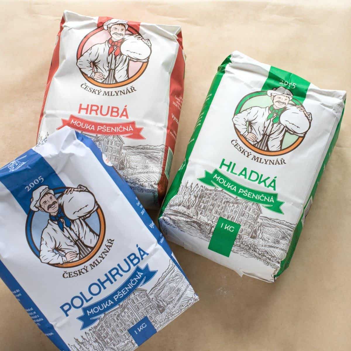 Three packages of Czech flour - hladká, polohrubá and hrubá.
