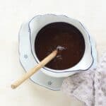 Czech plum butter sauce (švestková omáčka) in a sauce boat.