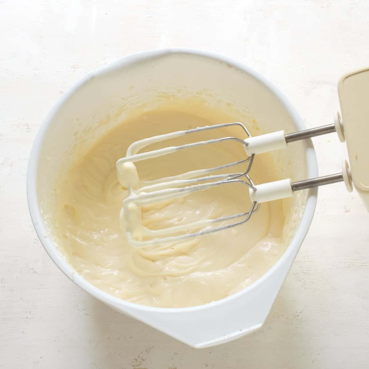 Cheese pudding cream in a white bowl.