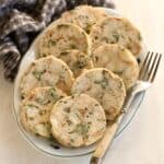 Slices of Czech dumplings (hrníčkové knedlíky) served on a plate.