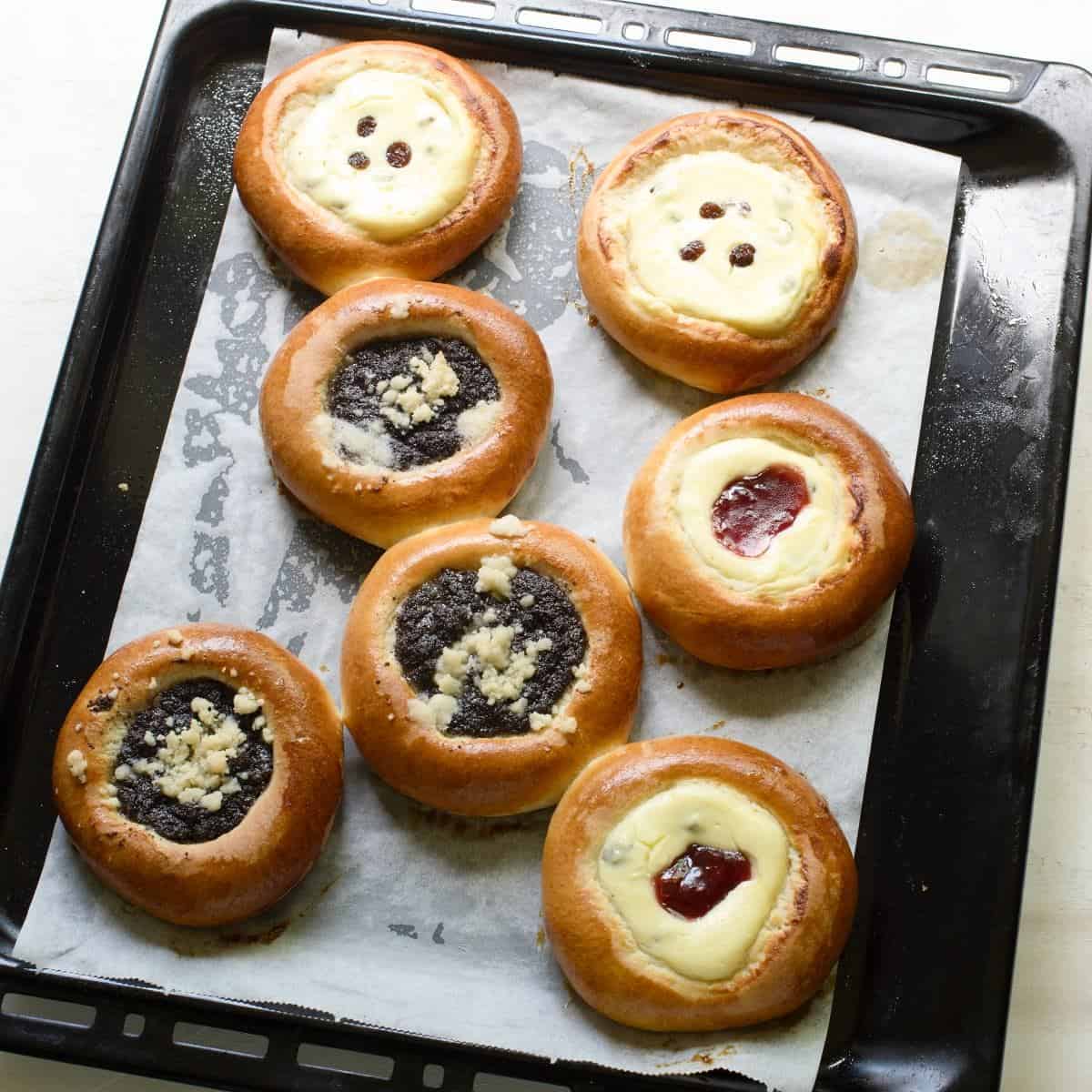 Baked Czech kolache on a baking sheet.