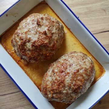 Two loaves of Czech sekaná meatloaf right after baking.