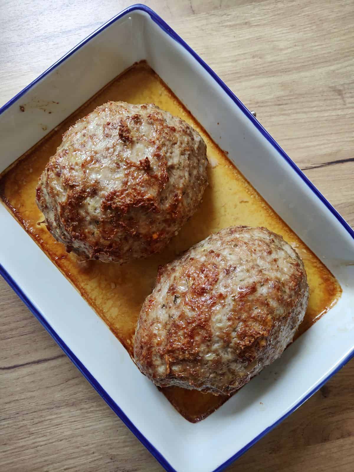 Two loaves of Czech sekaná meatloaf right after baking.