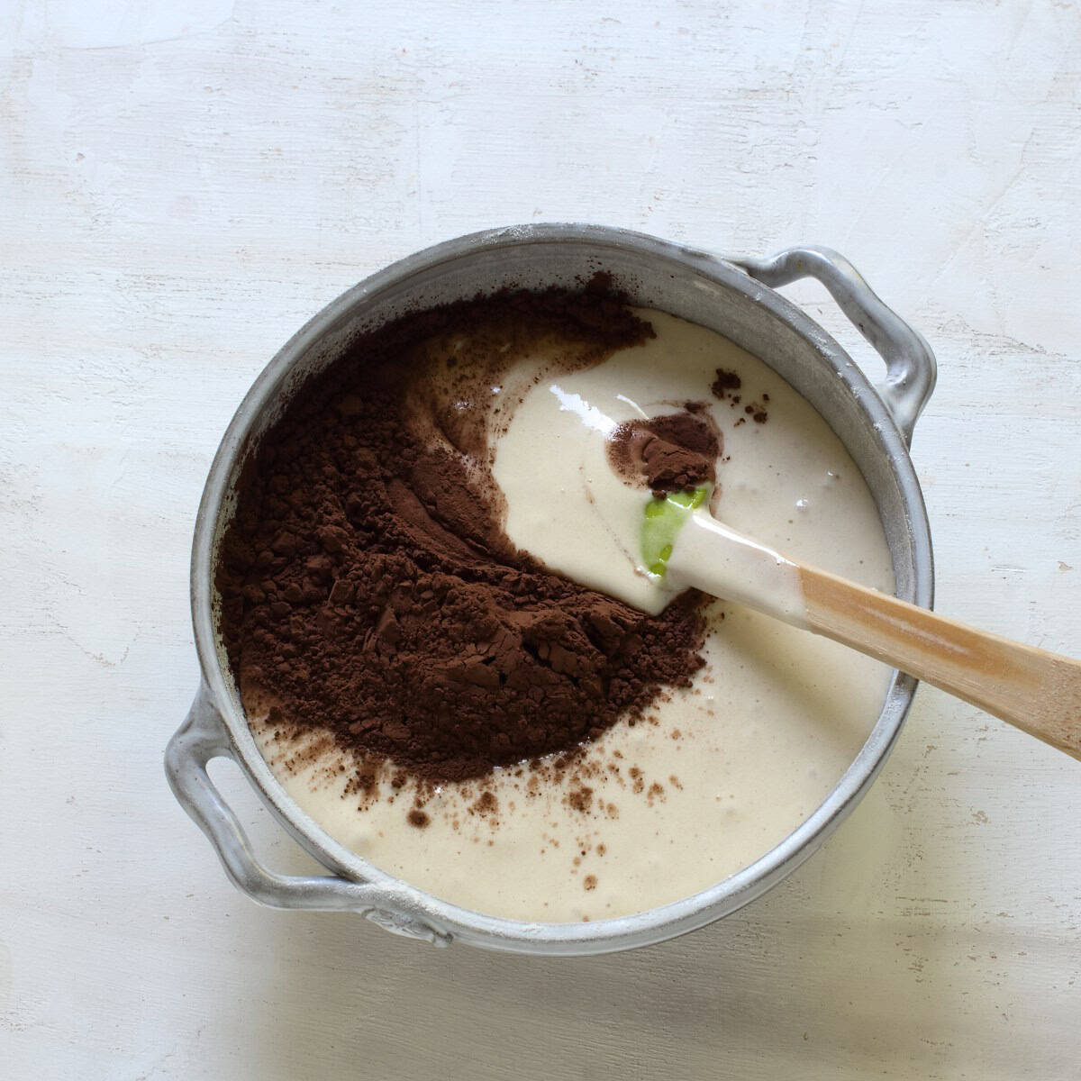Making cocoa part of batter for Czech bábovka.