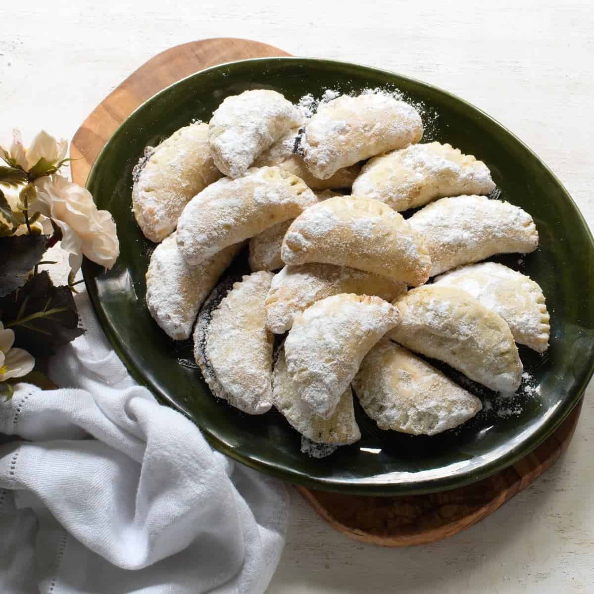 Baked Czech cheese dough crescents with blum butter (šátečky plněné povidly).