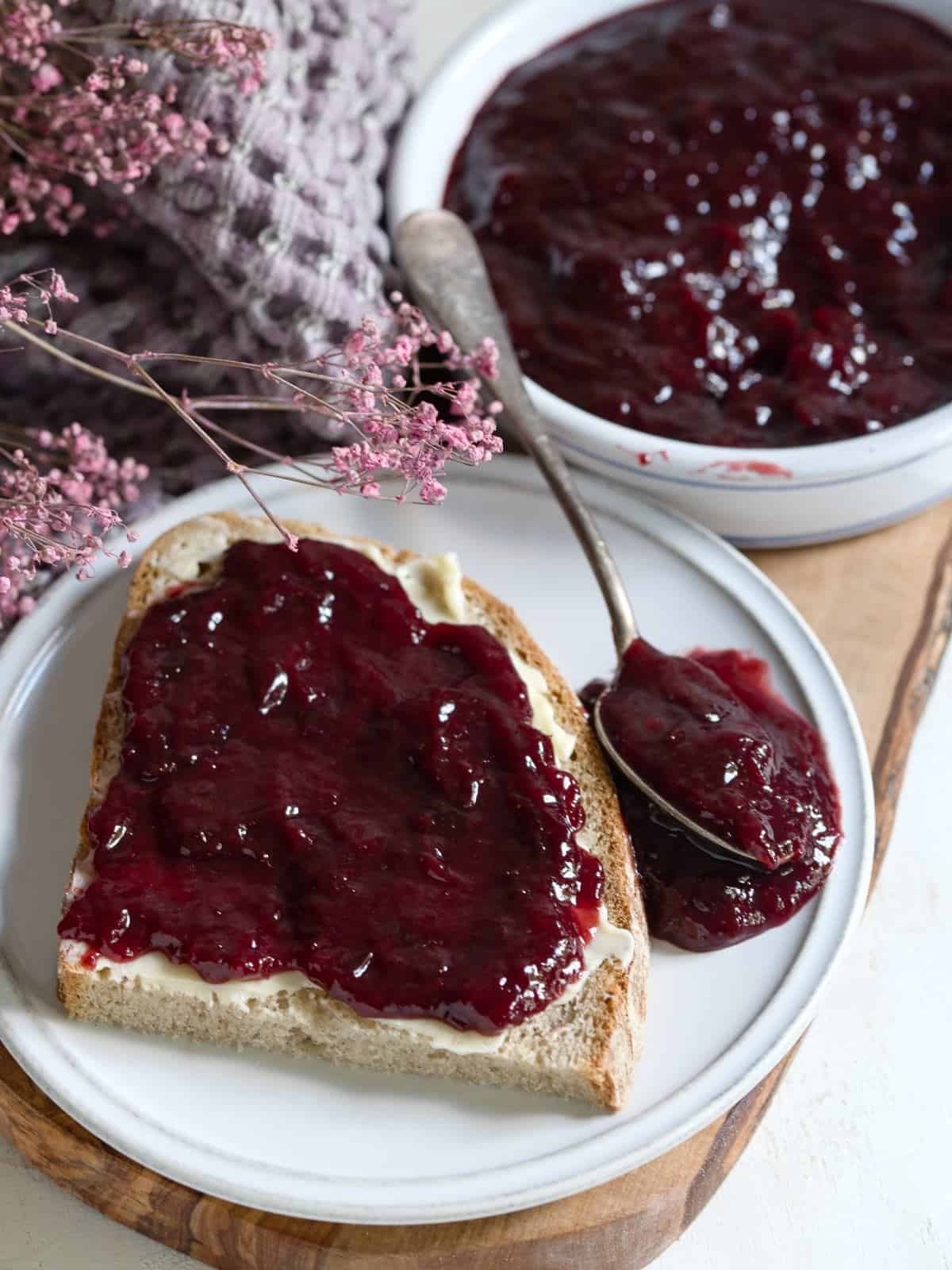 Czech povidla plum butter spread on a slice of rye bread.