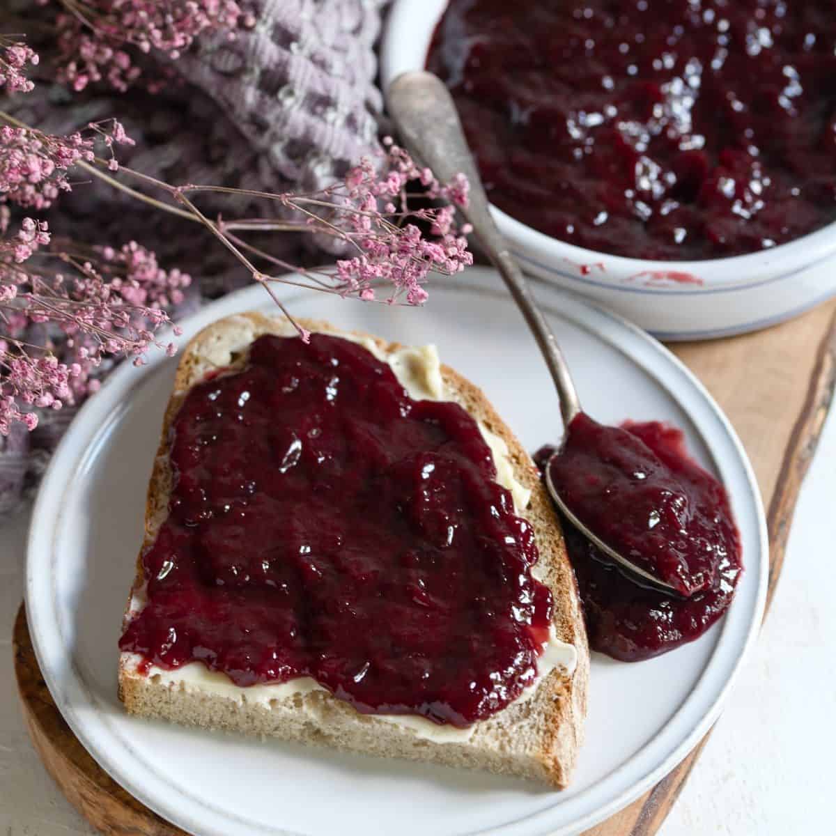 Czech povidla plum butter spread on a slice of rye bread.