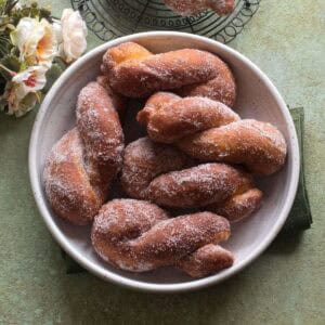 Fried šišky served in a round bowl.