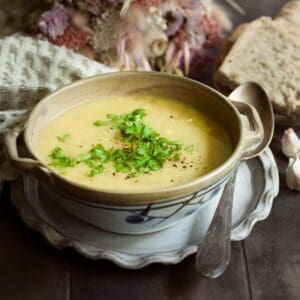 Czech bread soup - chlebová polévka, served in a bowl.