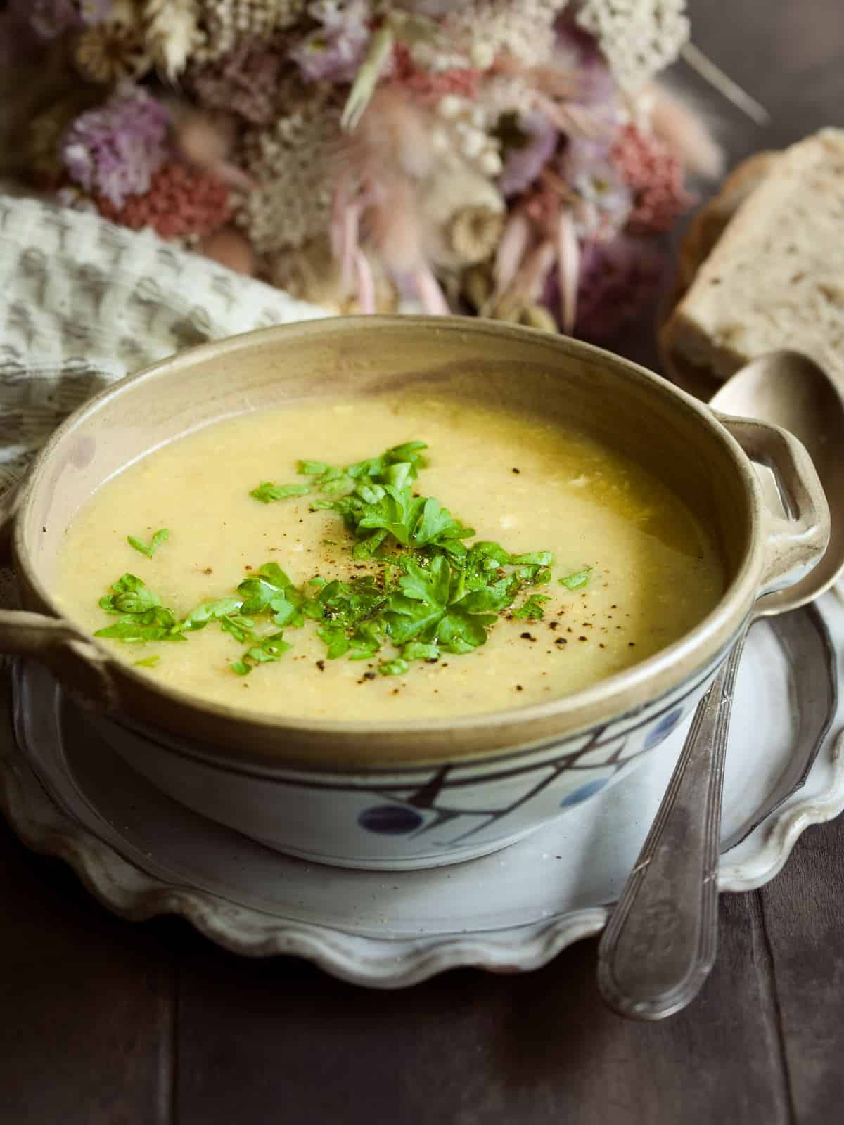 Czech bread soup - chlebová polévka, served in a bowl.