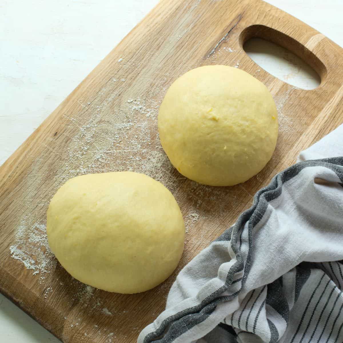 Two balls of yeast dough for Czech frgál kolache.